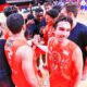 I giocatori del Derthona Basket raccolti per l'urlo e per caricarsi prima di una partita